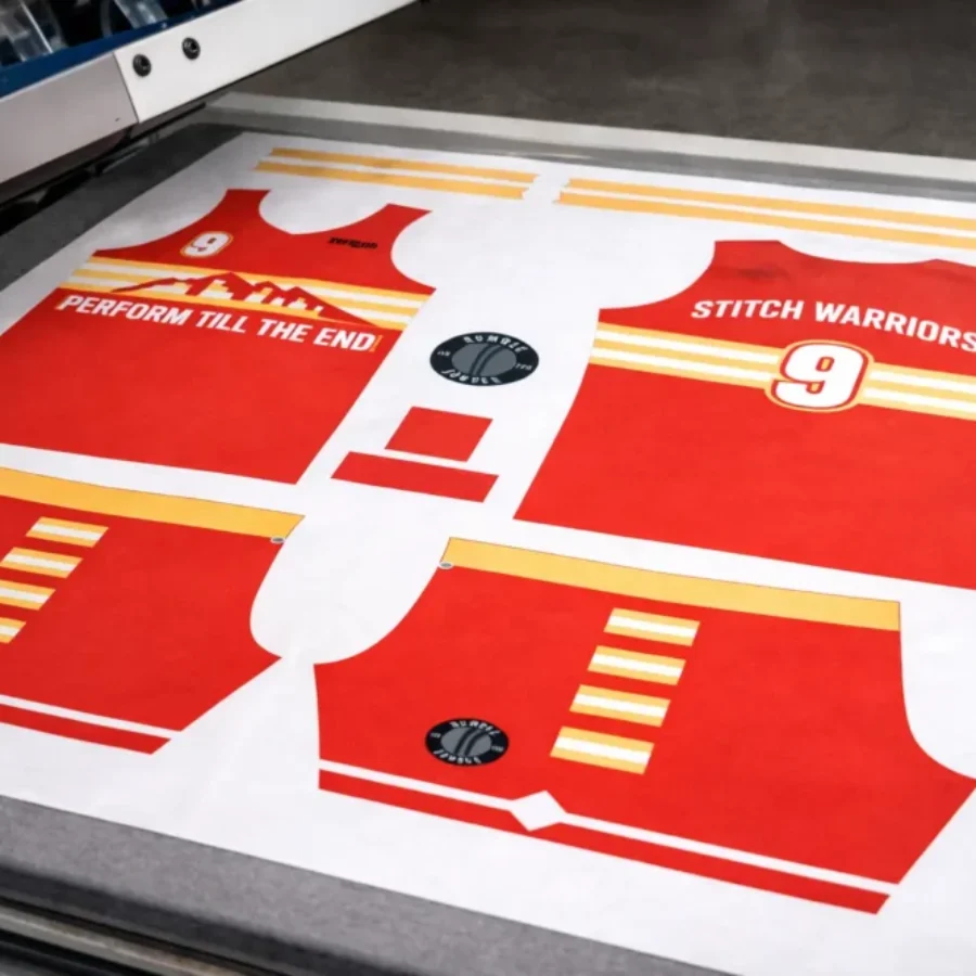 After sourcing, the fabric is cut into panels based on the patterns. Then, depending on the client's requirements, these panels undergo printing or embroidery.